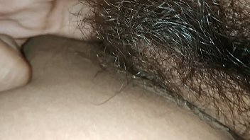 Fingering in hairy pussy with two fingers
