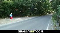 Hitchhiking blonde granny rides his young cock